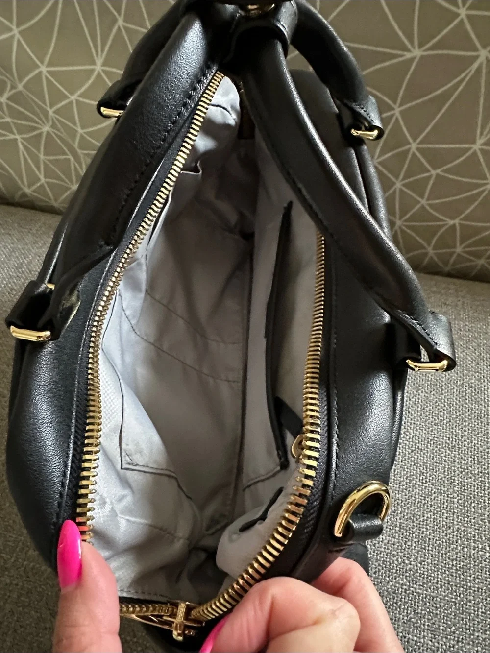 Tumi Leather Adrian Voyageur with Gold Hardware